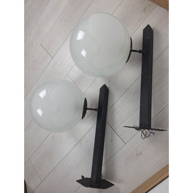 Wall Lamps in Black Lacquered Iron and Brass with Etched Glass Sphere, 1950s, Set of 2, in Good conditions. Designed 1950...