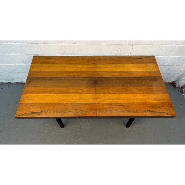Elegant and versatile mid-century modern dining table Attributed to Milo Baughman for Directional. This sophisticated...
