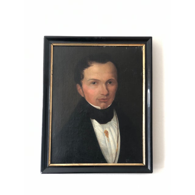 This pair of antique original portrait paintings from the 1840s shows a Dutch gentleman and lady. The married couple are...