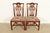 An outstanding pair of Chippendale or Georgian style side chairs or dining chairs By Henredon USA, Circa 1980s Carved...