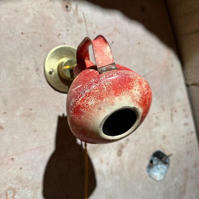 For your consideration, an industrial red wall lamp. Made in the USA circa the 1960s. Original red pair. Retrofitted to...