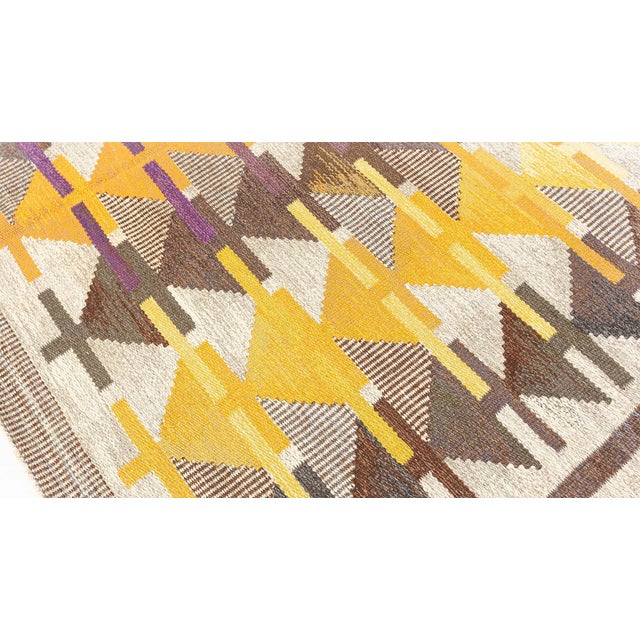 Mid-20th Century Swedish rolakan rug by Gavleborgs Lans Hemslojd Size: 6'7" × 9'9" (200 × 297 cm) This striking vintage...
