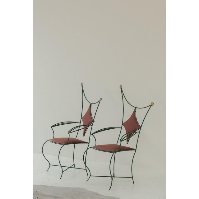 Set of 2 armchairs designed by Marco de Gueltzl around 1990. The frame is manufactured in green lacquered rebar with 2...