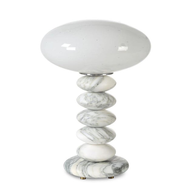 This small sculptural table lamp features softly rounded pieces of Italian Arabescato marble, carefully stacked in a...