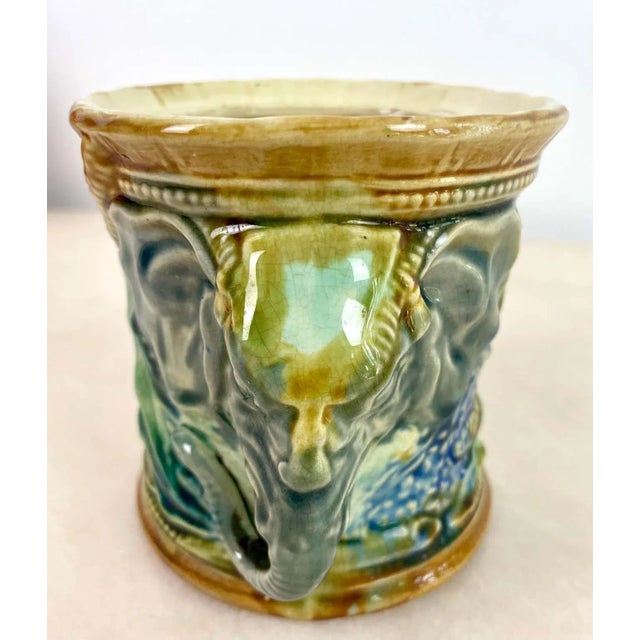 Tobacco jar or blue and green pencil jar in slip signed Frie Onnaing, circa 1890. The two handles are elephant heads,...