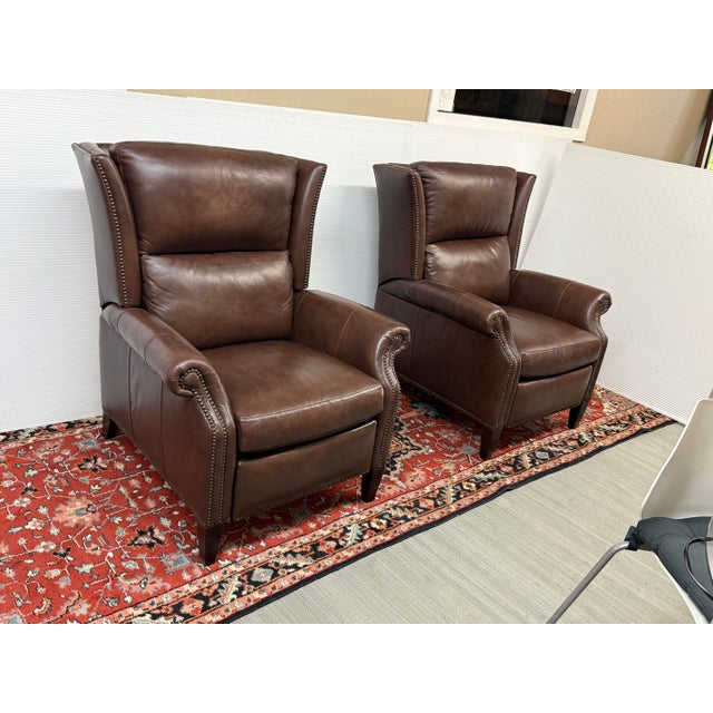 Design Plus Gallery presents a Pair of Sami Power Recliners from Hancock & Moore. Upholstered in brown leather, this...