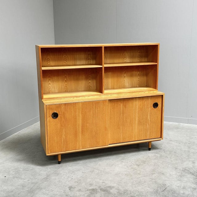 Vintage Highboard by Erich Stratmann for Idee Möbel, 1960s, in Good conditions. Designed 1960 to 1969 This piece has an...