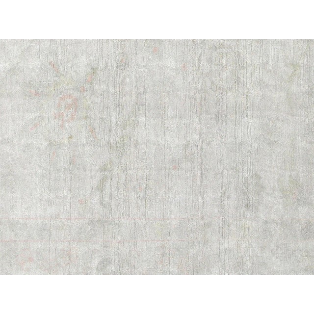 Experience the elegance of a Vintage Egyptian Sultanabad Rug, hand-woven with wool on a cotton foundation in the Nile...