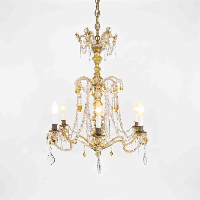 1930s Clear Crystal Chandelier with Pale Yellow and Amber Details. This six-light Italian chandelier is in good condition,...