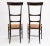 Pair of Wing Ladderback Chiavari "Super Leggera" Chairs, Italy, 1950s. Pristine original cane seats on a patinated...