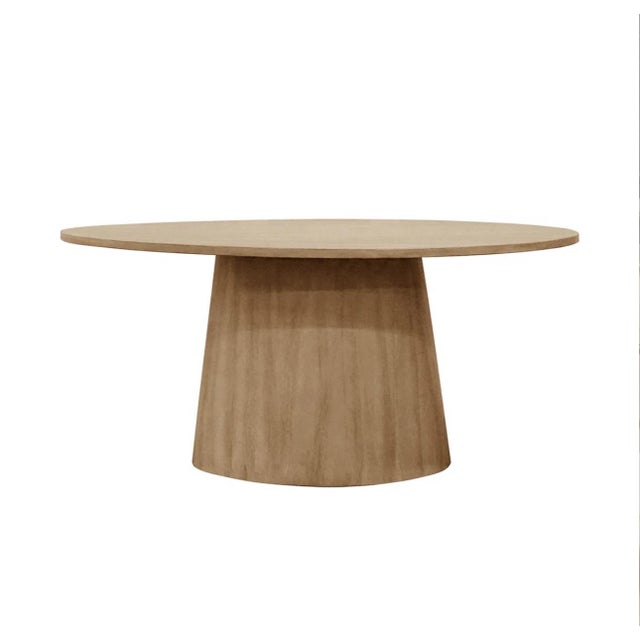 This custom-crafted dining table is made entirely from solid white oak and designed with a refined, modern sensibility....