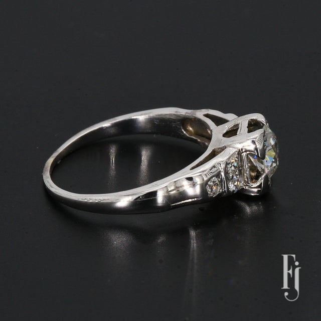 Here is a 14k White Gold Multi-Stone Engagement Ring featuring a 0.5ct. I/SI2 Old Mine Cut Diamond Center & Six ~0.26ct....