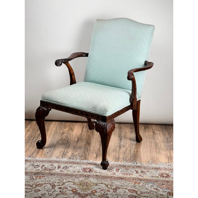 An elegant mid 18th century classic George II Gainsborough armchair, this piece captures the refined proportions and...