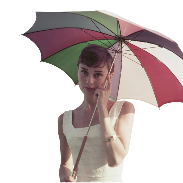 Belgian-born actress Audrey Hepburn (1929 - 1993) on a golf course at the Bürgenstock resort, Switzerland, 1954. (Photo by...