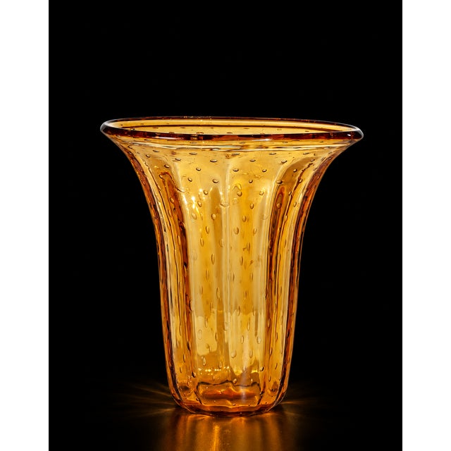 Gracefully flared and richly hued, this vase is hand blown in authentic Murano glass with a distinctive bubbled texture...