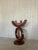 A striking sculptural candle holder from a Dutch church, dating back to the 1960s. Crafted entirely from solid rosewood,...