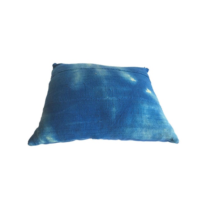 Authentic vintage cotton indigo pillow (never been used )crafted from traditional West African textiles. Each piece is...