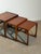 A beautiful mid-century modern G-Plan Quadrille nest of three tables, crafted in richly grained teak and featuring the...