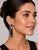 18K Tassle earrings with detachable tops containing 2 cabochon cut tanzanites weighing 8.89 carats, 8 emeralds weighing...