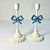 This pair of cast iron Candlestick Holders are delightful. They feature a French Blue Bow on an ivory stem, base and...