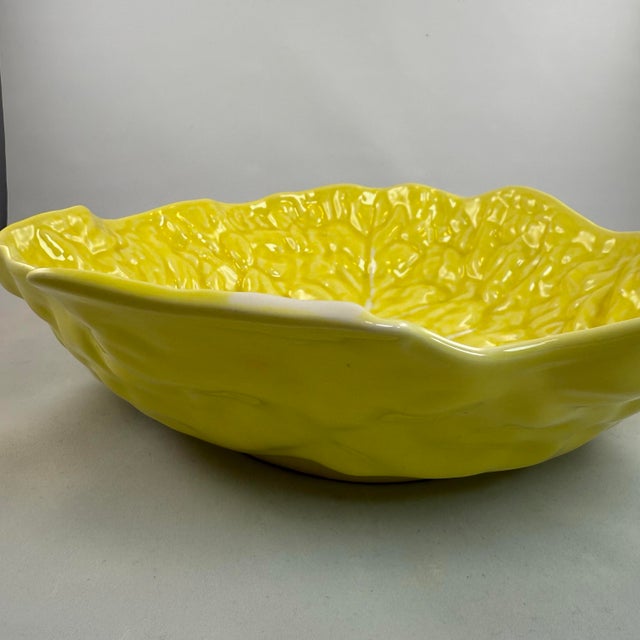 This beautiful bright yellow Secla large salad serving bowl is a perfect example of Portuguese cabbageware pottery....