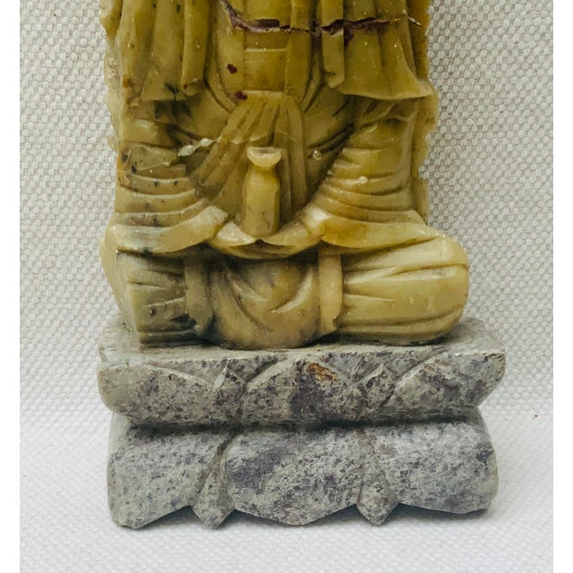 …For your consideration… a hand-carved Chinese stone Buddha sculpture of quiet dignity, dating to the late 19th century....