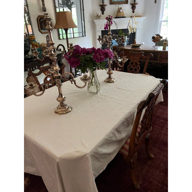 Thirtybtwo inches tall silver chrome candelabras. Majestic lighting for any room. There are three arms with candle sockets...