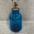 Beautiful Blue Table Lamp in the Manner of Blenko. Made with blown glass and a wooden base. Original brass hardware.