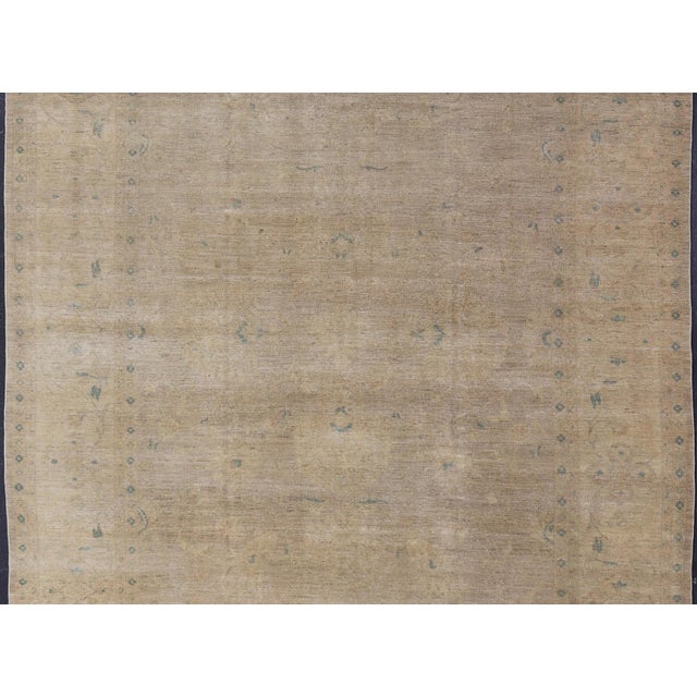 Minimalist antique Afghan Tabriz rug with all-over field of tan, taupe, brown and blues, rug MF-2, country of origin /...