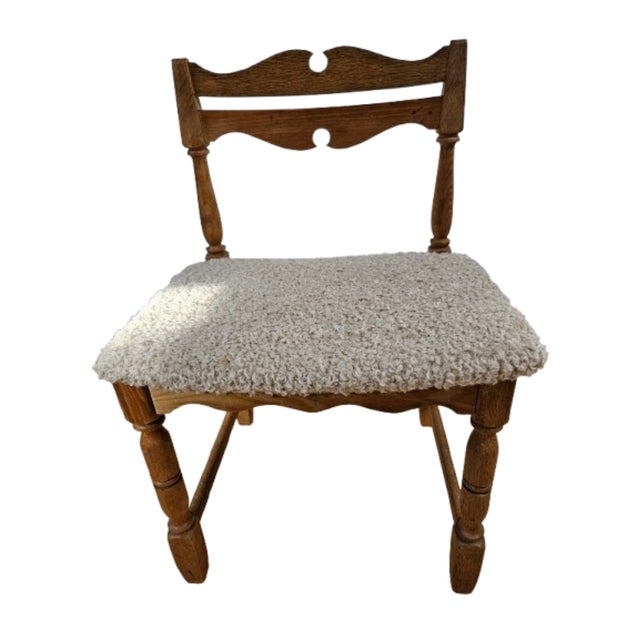 This set represents classic Danish cabinetmaking traditions, combining solid oak construction with refined decorative...