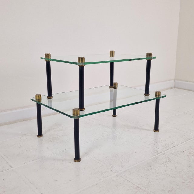 This rare and exceptionally sleek set of french display tables dates from the late 1930s or 1940s, representing the...