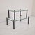 This rare and exceptionally sleek set of french display tables dates from the late 1930s or 1940s, representing the...