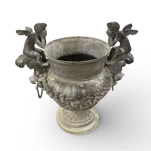 Metal 1970s Pair of Monumental Neoclassical Bronze Cherub Urn Planters For Sale - Image 7 of 10