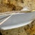 Elite Limoges Porcelain Platter. Has wear and a small chip as pictured. Measures 13.5 inches across.