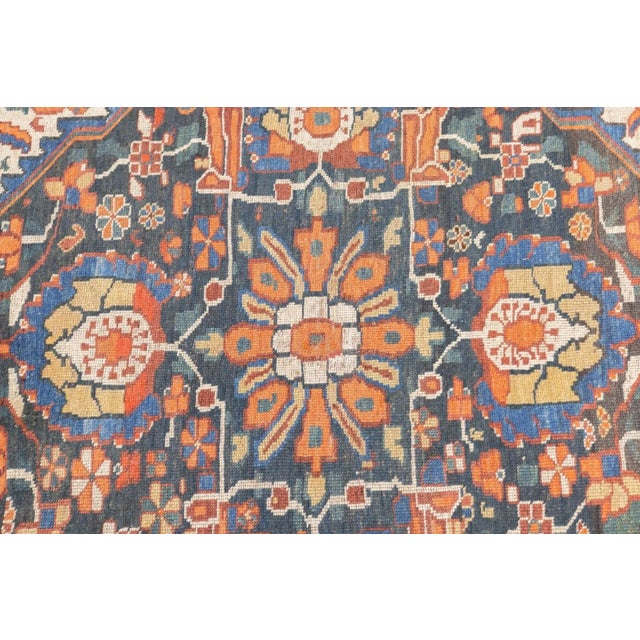 Probably Maizidi sub-tribe in SW Persia, the ecru field shows stems, polychrome flowers and rosettes, and supports a...