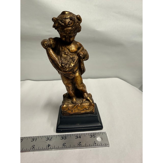 Plastic Vintage Borghese Gold-Tone Cherub Statue on Black Base For Sale - Image 7 of 8