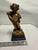 Plastic Vintage Borghese Gold-Tone Cherub Statue on Black Base For Sale - Image 7 of 8