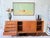 A generous and well-proportioned Swedish modern teak sideboard by AVIKKA, Sweden, circa 1960s. At 75" wide, this is a rare...