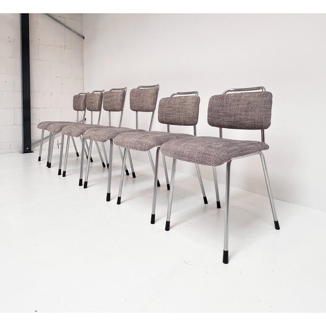 Set of 6 vintage tubular frame chairs from the Gebroeders De Wit company from the 1960s. These “floating” chairs have been...