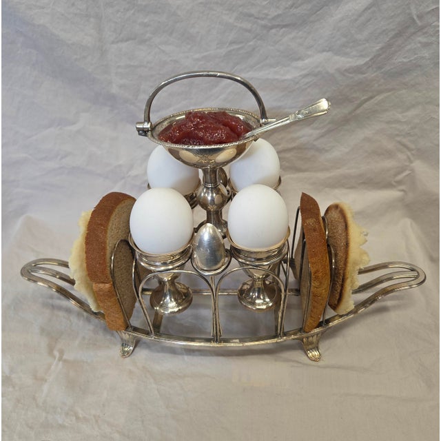 An incredibly sweet and elaborate antique 19th century English Sheffield silverplate toast rack with four soft boiled egg...