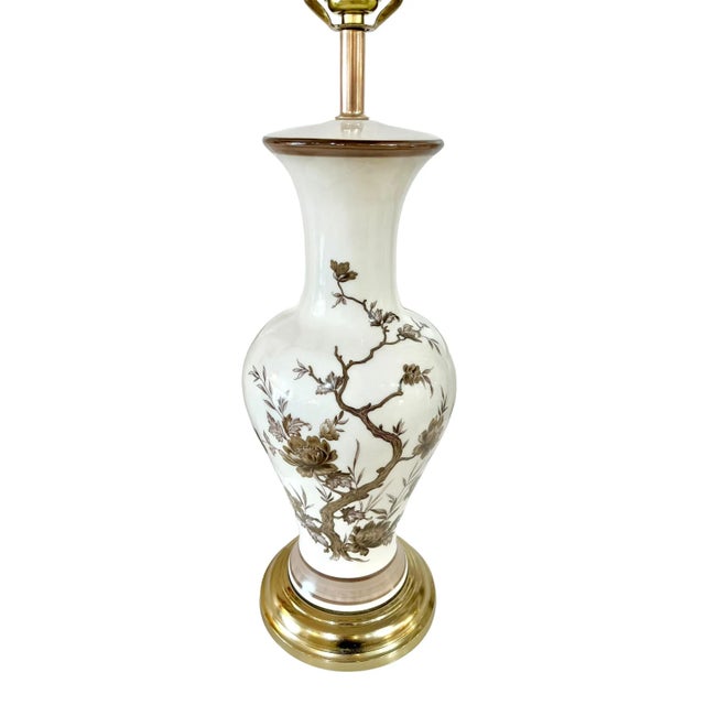 Lovely pair of brown and white Transferware lamps. Foliage and floral scene in differing shades of brown on a white...