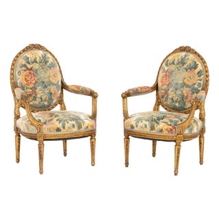 Pair of Louis XVI Style Tapestry Upholstered Giltwood Fauteuils For Sale