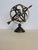 This type of heavy metal armillary sphere was used back in the 200 B.C. time period for astronomical readings. It is now...