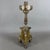 Majestic and elegant liturgical altar candlestick in a neoclassical and eclectic style, finely crafted in relief and...