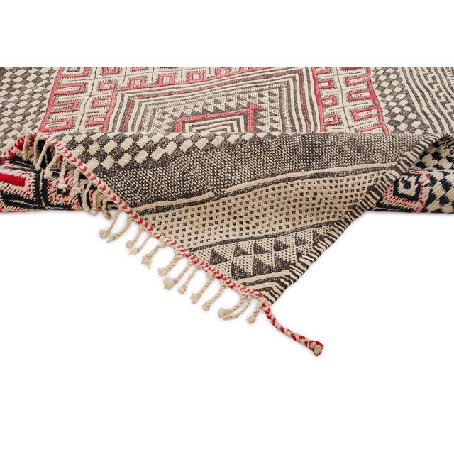 Bohemian, Handwoven Berber vintage rug showcasing intricate geometric diamond patterns in soft Beige, accented by vivid...