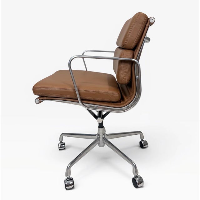 A beautifully restored Eames Aluminum Group Soft Pad Management Chair, originally designed by Charles &amp; Ray Eames....