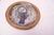 Charming outsider art charger / decorative plate depicting a jovial young girl. Pleasant color palette and figure with...