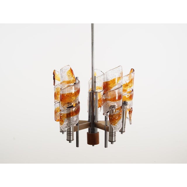 The lamp was made in the 1970s, Italian production. Made of metal, wood and Murano glass. The unique construction is not...