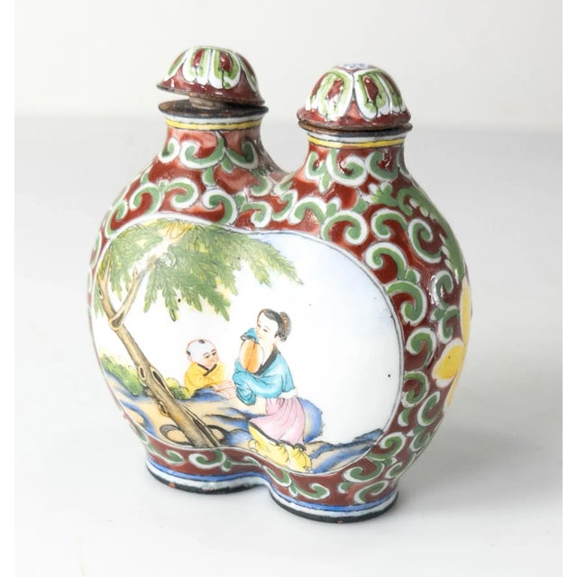 We are selling this vintage Chinese 20th century Canton or Peking enamel double snuff bottle with figures and apocryphal...