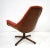 An exceptionally stunning very comfortable upholstered swiveling lounge chair with full bent walnut back and bottom....